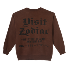 Load image into Gallery viewer, Zodiac “Visit Us” Knit Sweater
