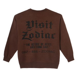 Zodiac “Visit Us” Knit Sweater